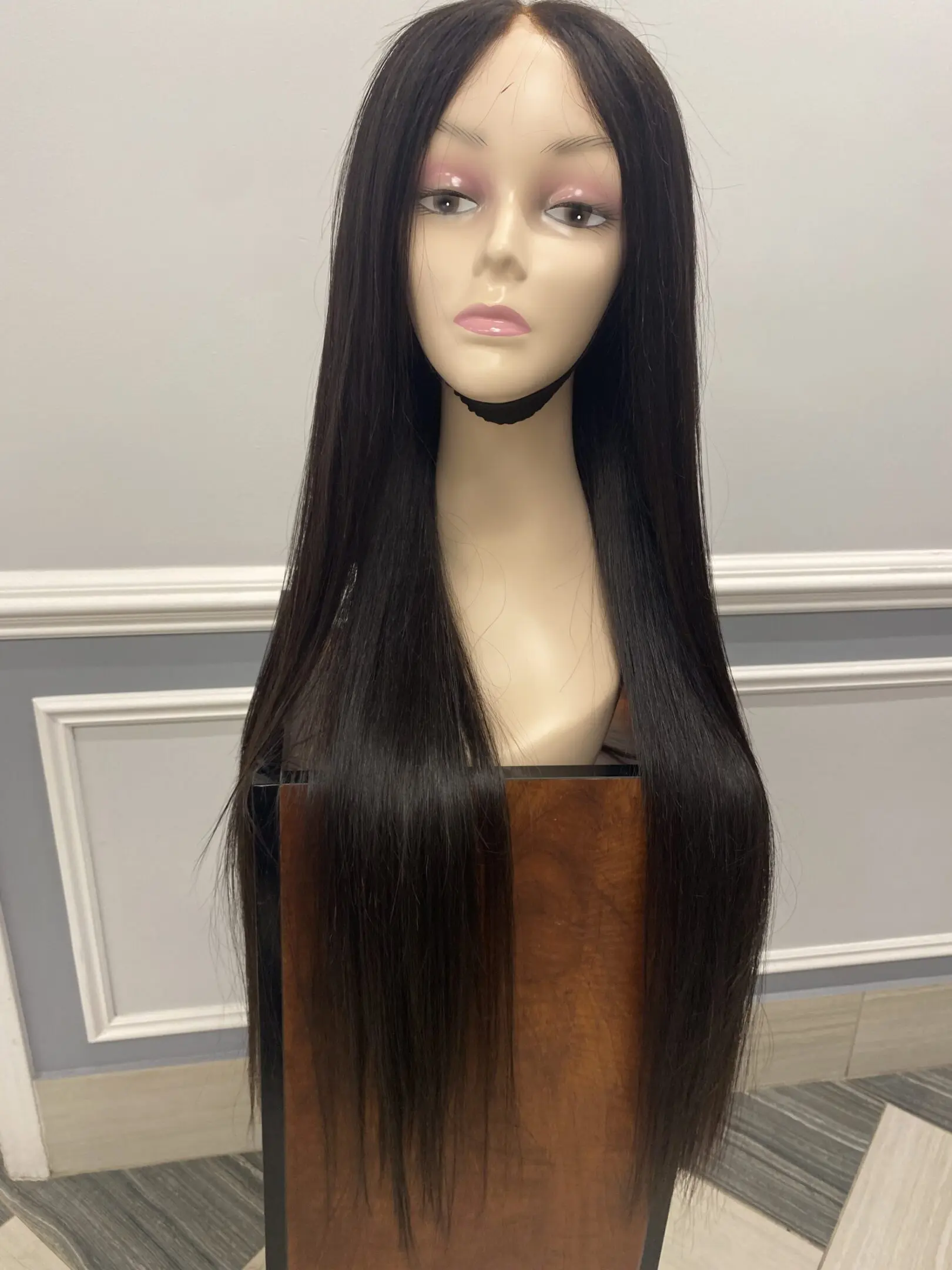 Long straight black human hair wig.