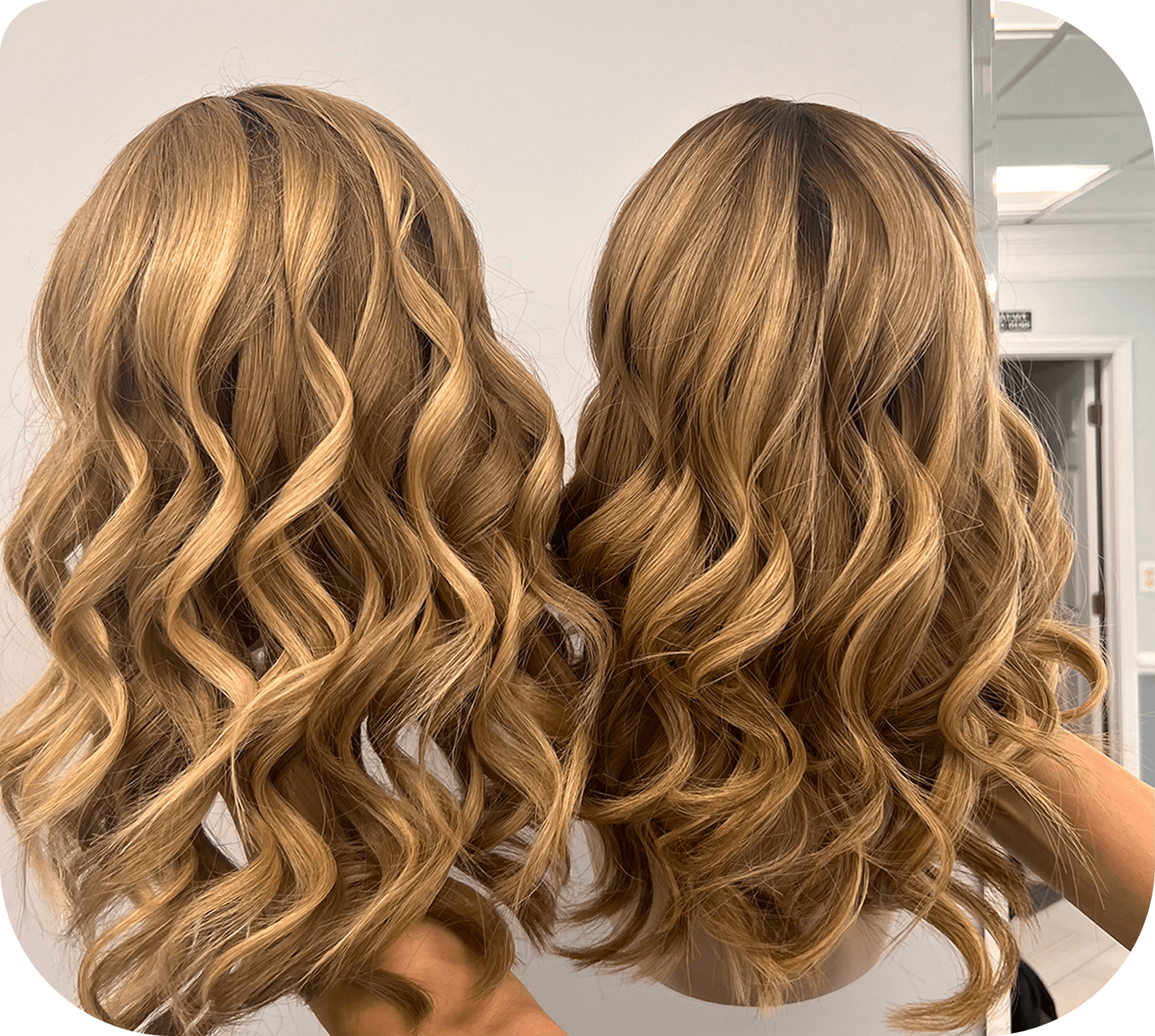 Two blonde wavy wigs side by side.